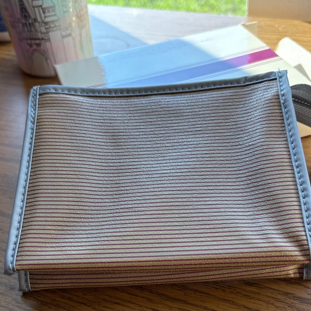 Avon Beauty Discovery Kit with tan and grey Accents